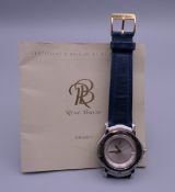 A Rene Boivin wristwatch with certificate of origin and guarantee.