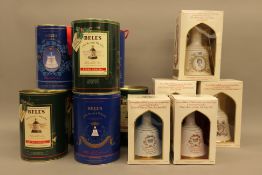 A collection of twelve boxed and full Wade Bells Scotch Whiskey decanters,