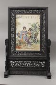 A Chinese porcelain insert table screen. 67 cm high.