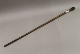 A 19th century rhino horn walking stick. 89 cm long.