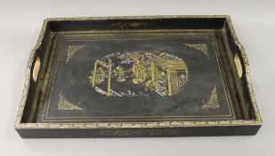 A chinoiserie lacquered tray. 61 cm wide.