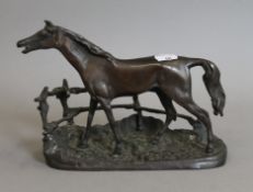 A bronze model of a horse. 22 cm long.