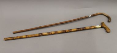 A Victorian bamboo sword/prodding stick and a bamboo cane. The former 88 cm long.