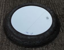 A large industrial circular mirror. 99 cm diameter.