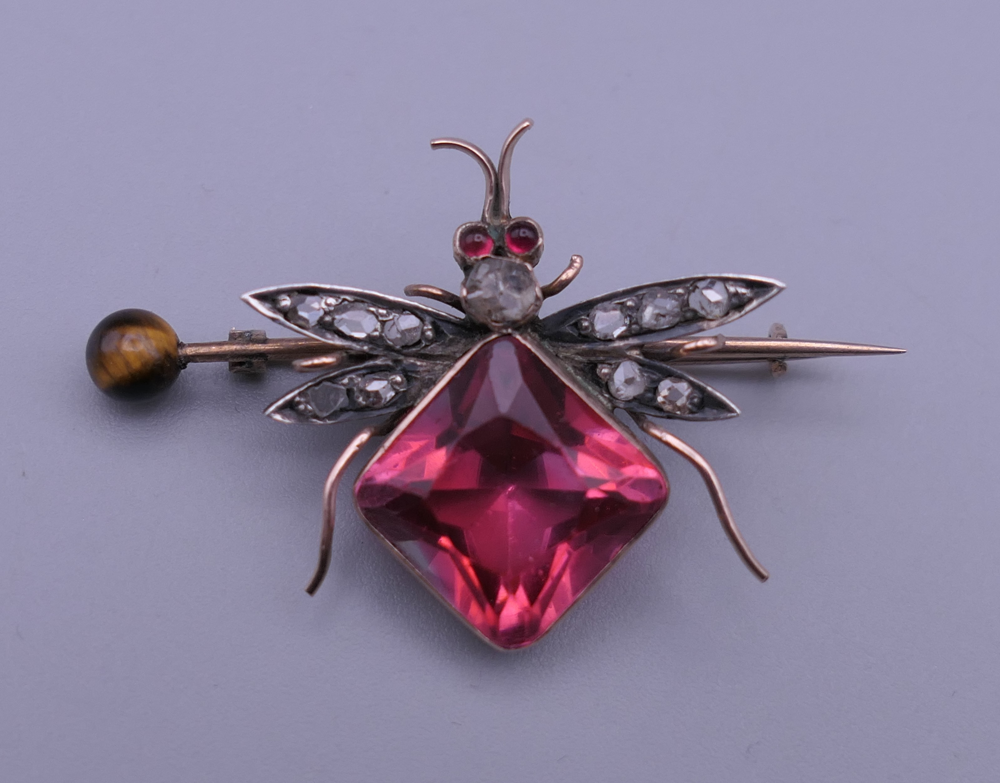 An unmarked gold diamond set bee brooch. 4 cm wide. - Image 2 of 7