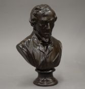 A 19th century patinated plaster bust of Disraeli. 20 cm high.