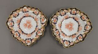 A pair of Royal Crown Derby porcelain plates. 25.5 cm wide.