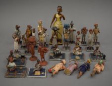 A quantity of Indian figures. The largest 16.5 cm high.