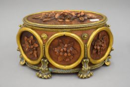 A 19th century ormolu mounted carved Blackforest casket. 28 cm wide.