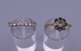 An unmarked eternity ring and a 9 ct gold ring. The former ring size N.