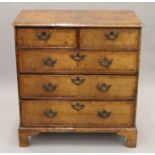 An 18th century walnut chest of drawers. 95 cm wide.
