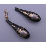 A pair of 19th century gold piquet inlaid tortoiseshell earrings. 4.25 cm high.