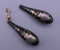 A pair of 19th century gold piquet inlaid tortoiseshell earrings. 4.25 cm high.