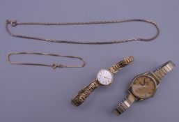 A 9 ct gold Accurist ladies wristwatch, another ladies wristwatch, a chain and a bracelet.