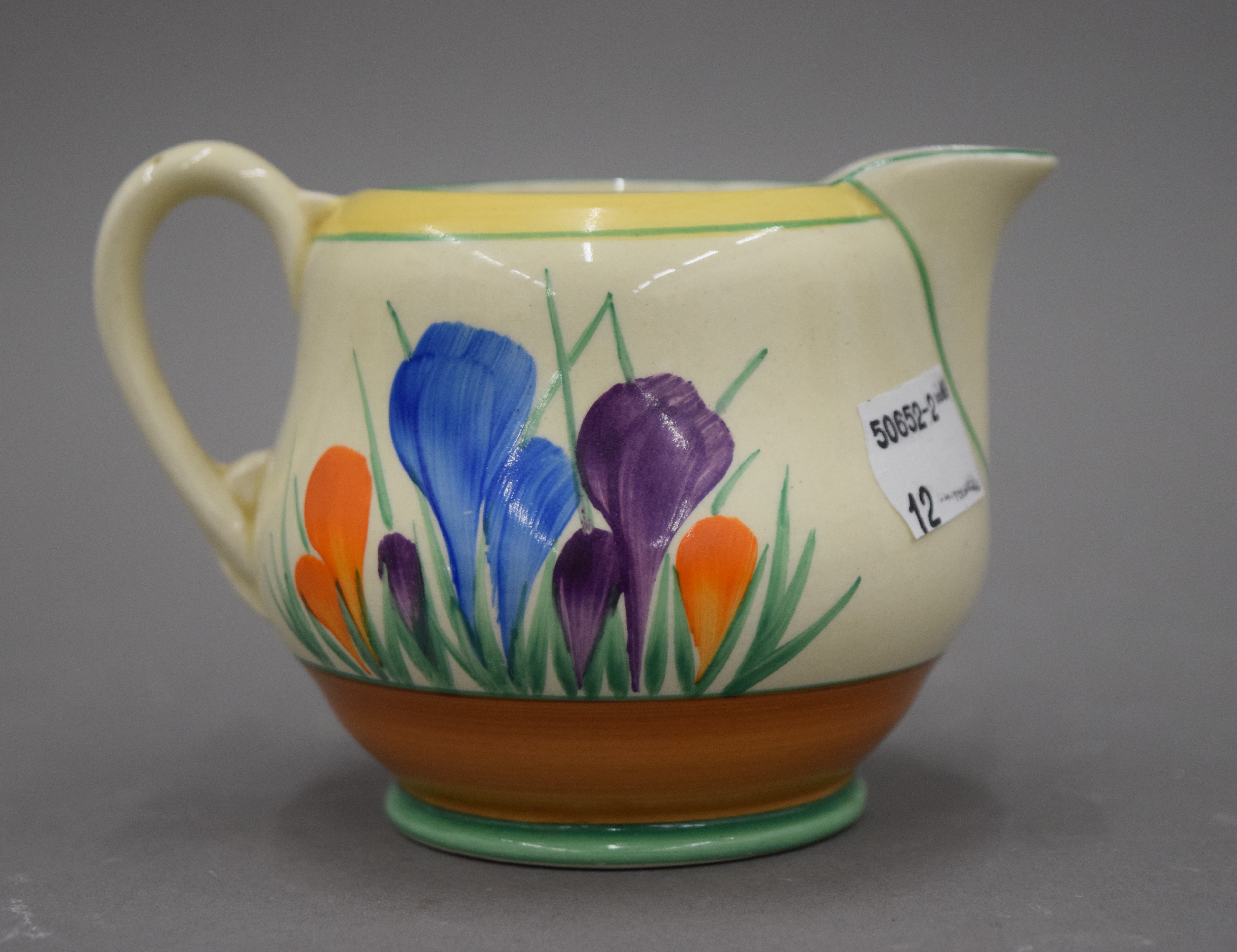 Three Clarice Cliff Crocus pattern jugs. The largest 12.5 cm high. - Image 7 of 8