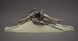 A Lejan 1930s porcelain mantle ornament formed as three swallows. 48 cm wide.