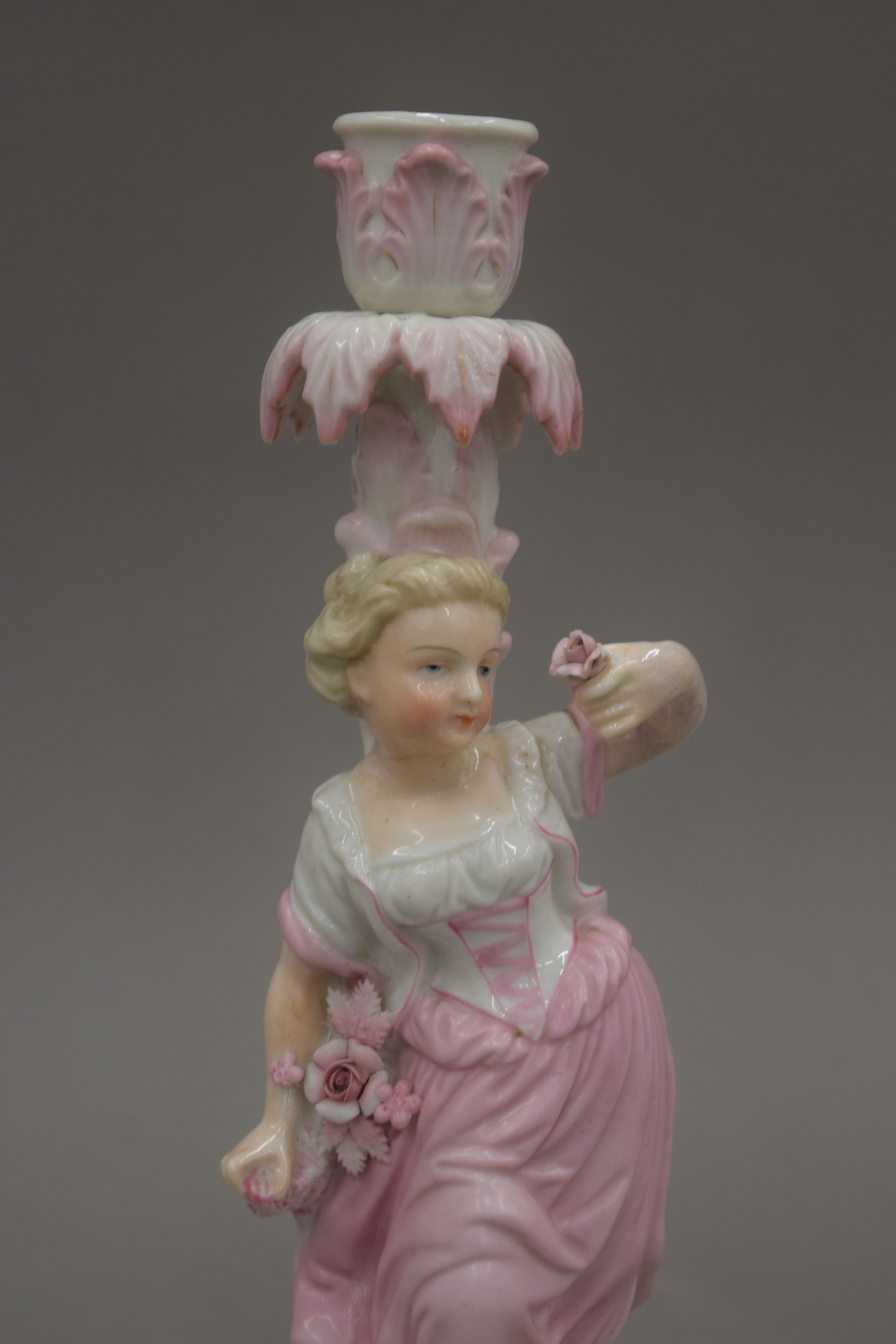 A pair of Continental porcelain figures together with a pair of 19th century candlesticks of - Image 4 of 14