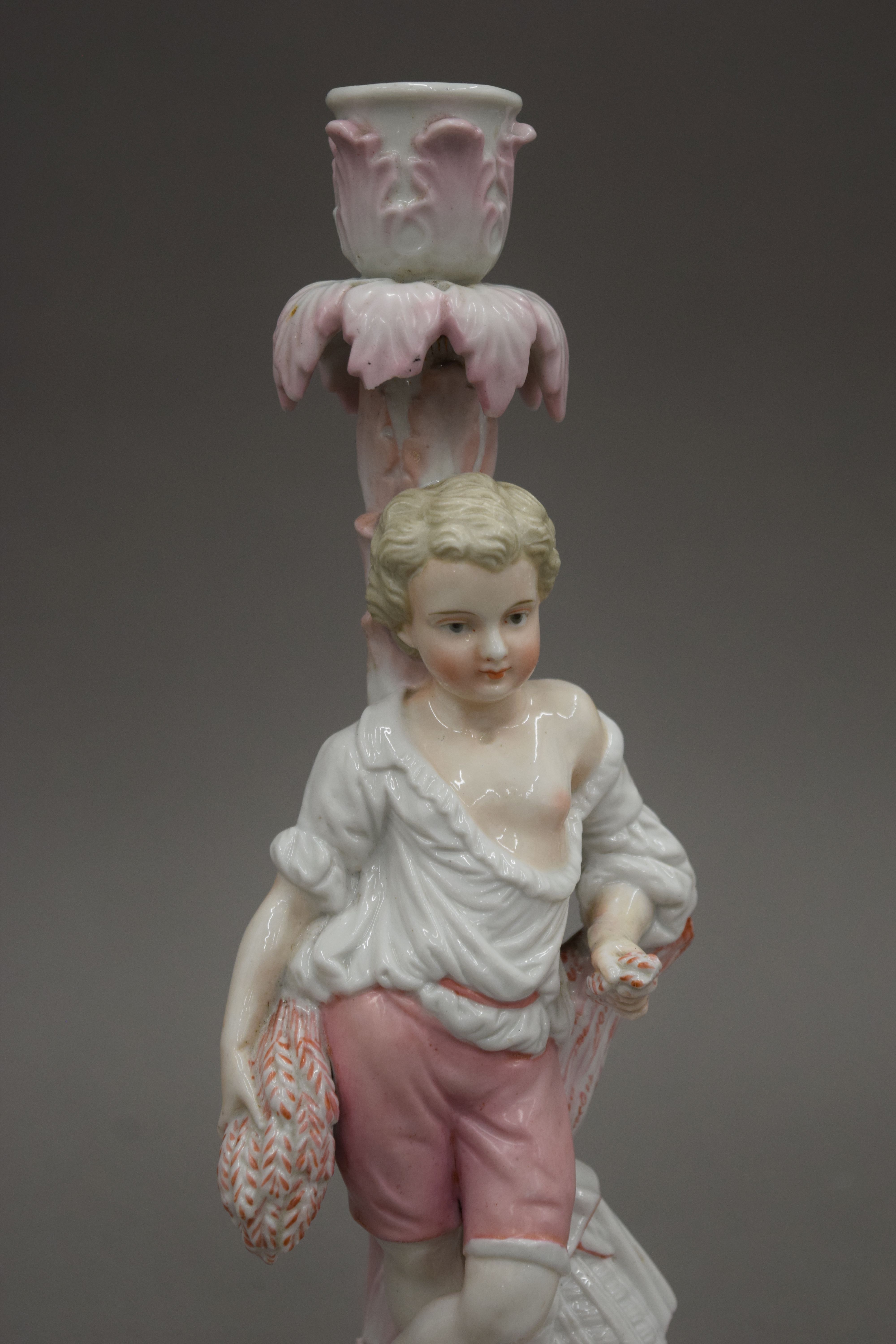 A pair of Continental porcelain figures together with a pair of 19th century candlesticks of - Image 6 of 14