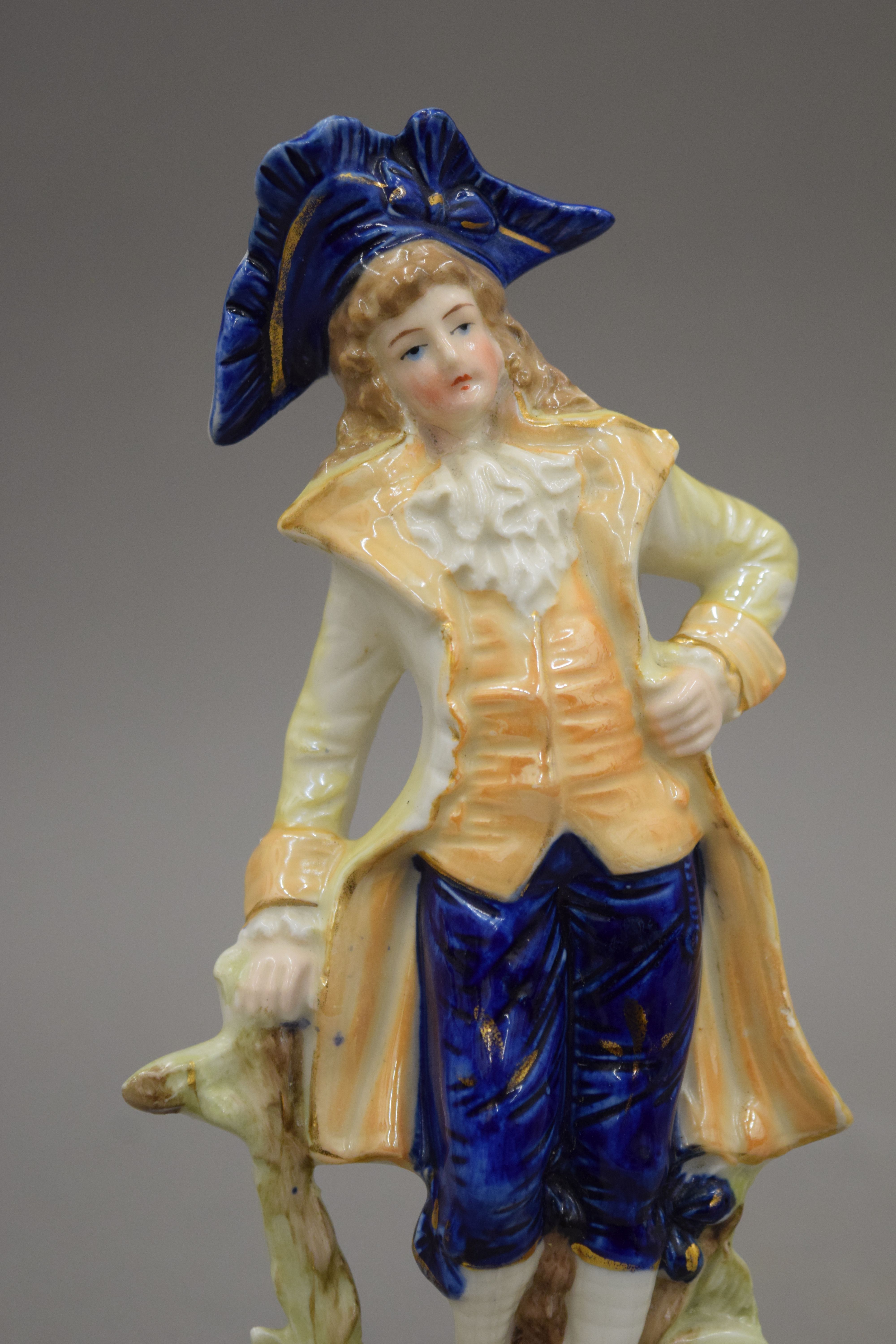 A pair of Continental porcelain figures together with a pair of 19th century candlesticks of - Image 13 of 14