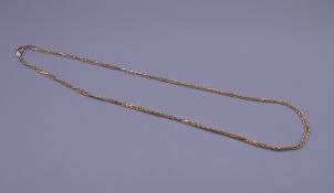 A 9 K gold chain. Approximately 46 cm long. 4.1 grammes.