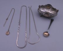 An 800 silver salt, a small quantity of silver jewellery and a plated salt spoon. 57 grammes.
