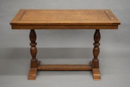 An early 20th century oak table. 125 cm long.