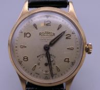 A vintage Roamer 9 ct gold cased wristwatch. 30 grammes total weight.