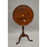 A late 19th century mahogany tripod table. 53.5 cm diameter.
