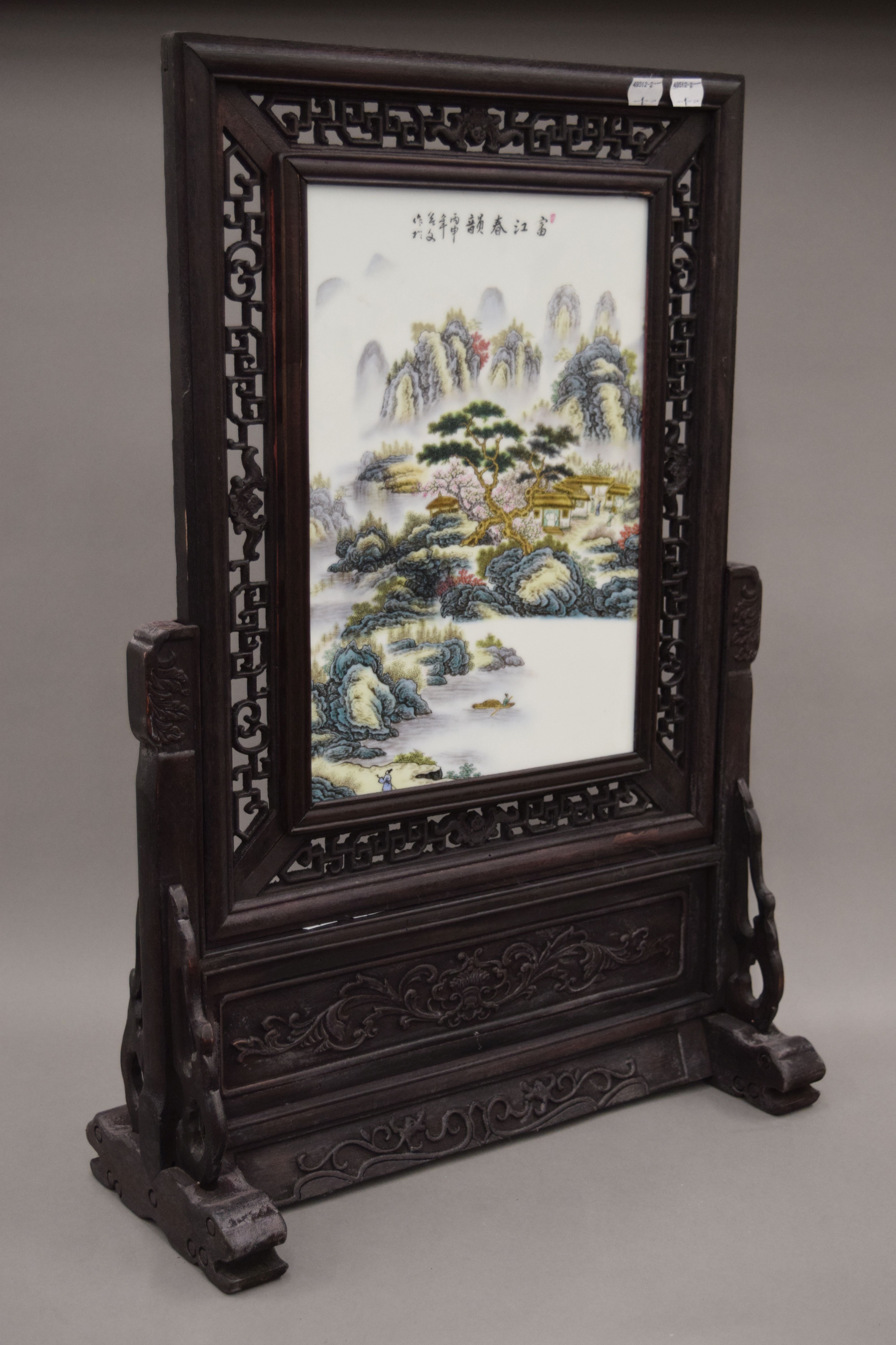 A Chinese porcelain screen on wooden stand. 67.5 cm high. - Image 4 of 7