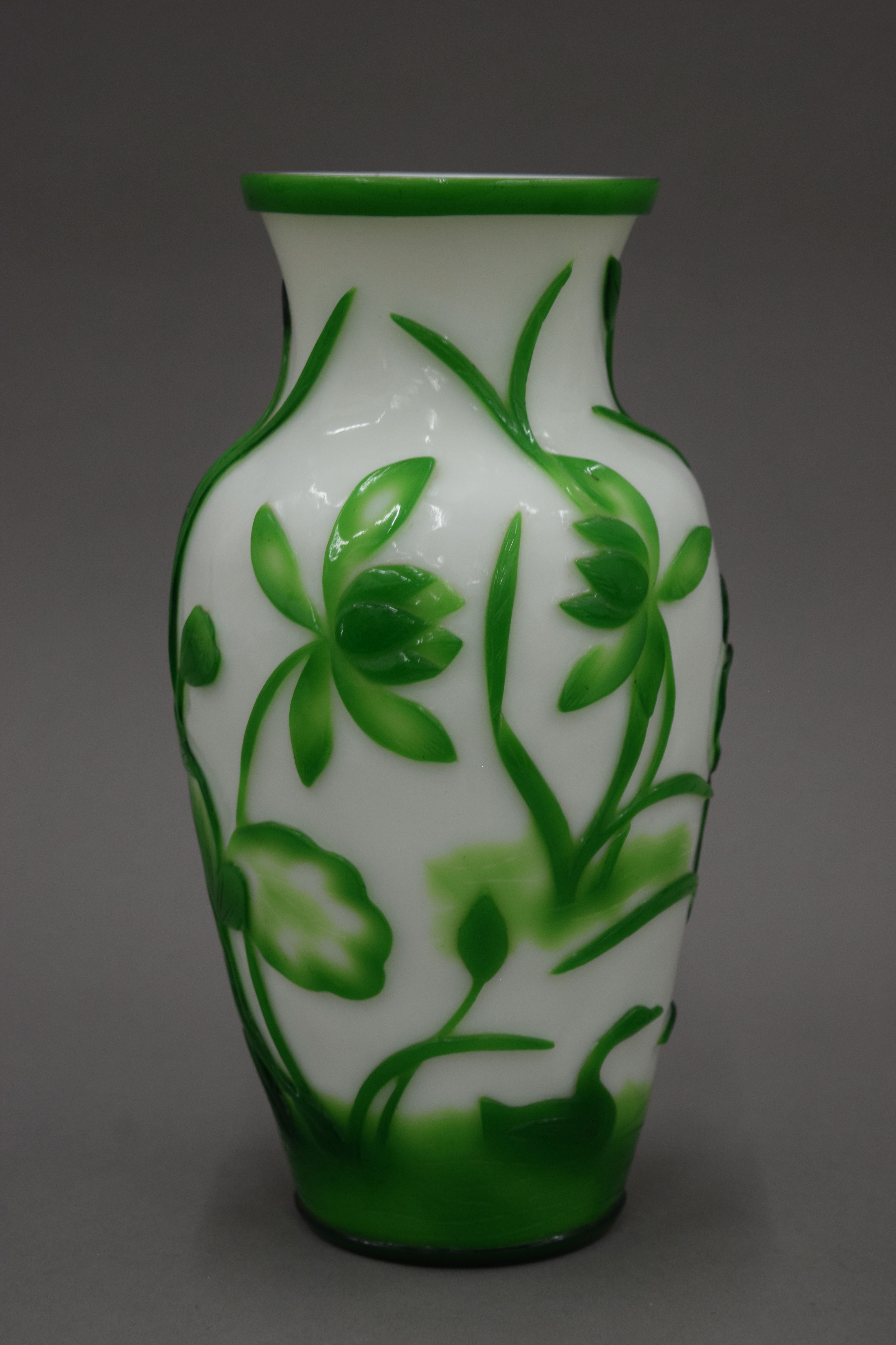 A Chinese Peking glass vase overlaid with ducks and water lilies, with seal mark to base.