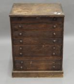 A small late 19th/early 20th century bank of drawers. 35.5 cm wide x 49 cm high.