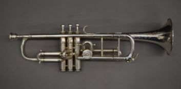 A rare Hawkes & Son silver plated trumpet in Bb and A with high pitch/low pitch slides,