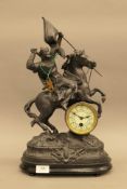 A large Victorian spelter Crusader clock, in working order. 49.5 cm high.