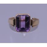 A 9 ct gold and amethyst ring. Ring size I. 2.7 grammes total weight.