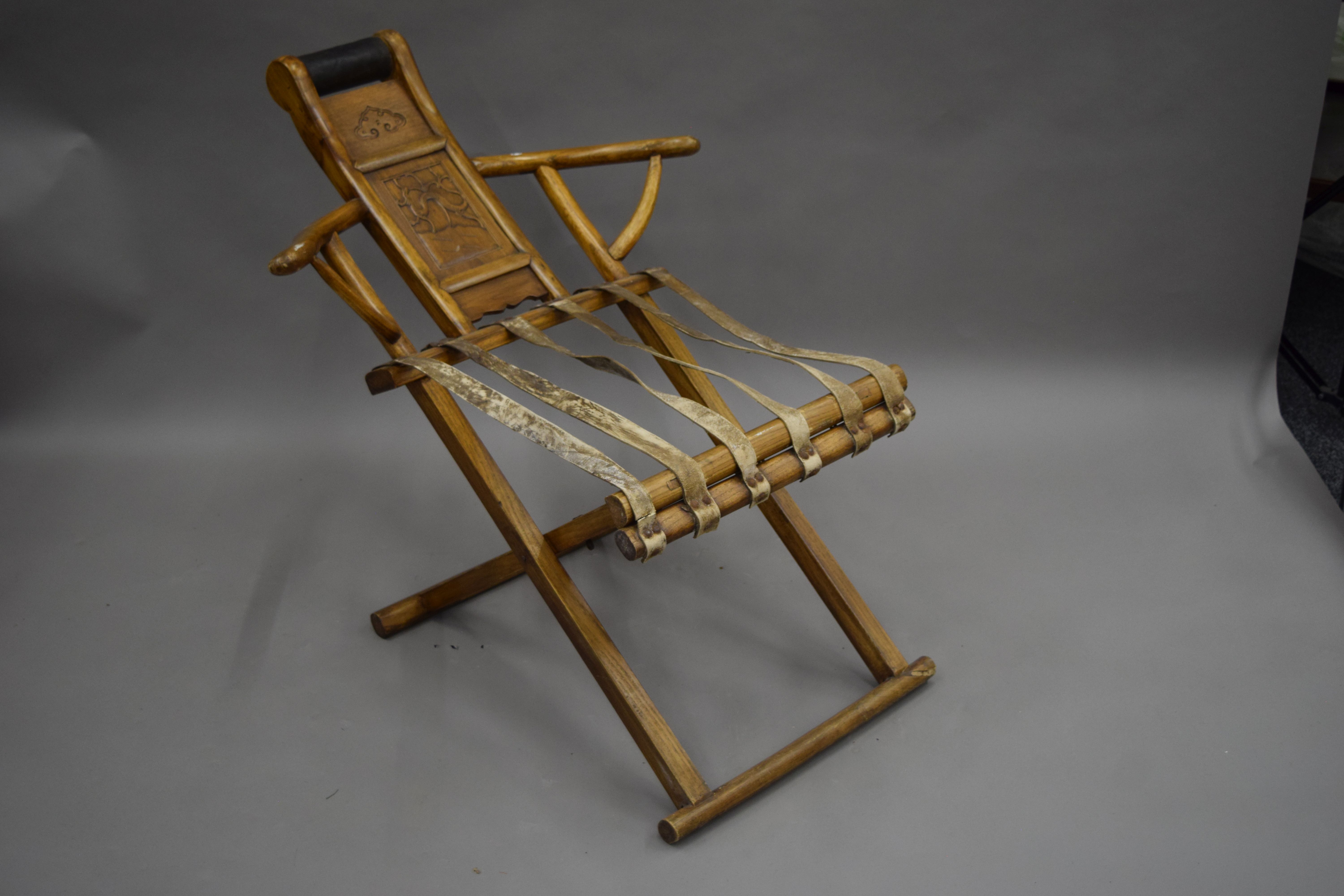 A Chinese elm folding chair. 74.5 cm wide. - Image 2 of 5