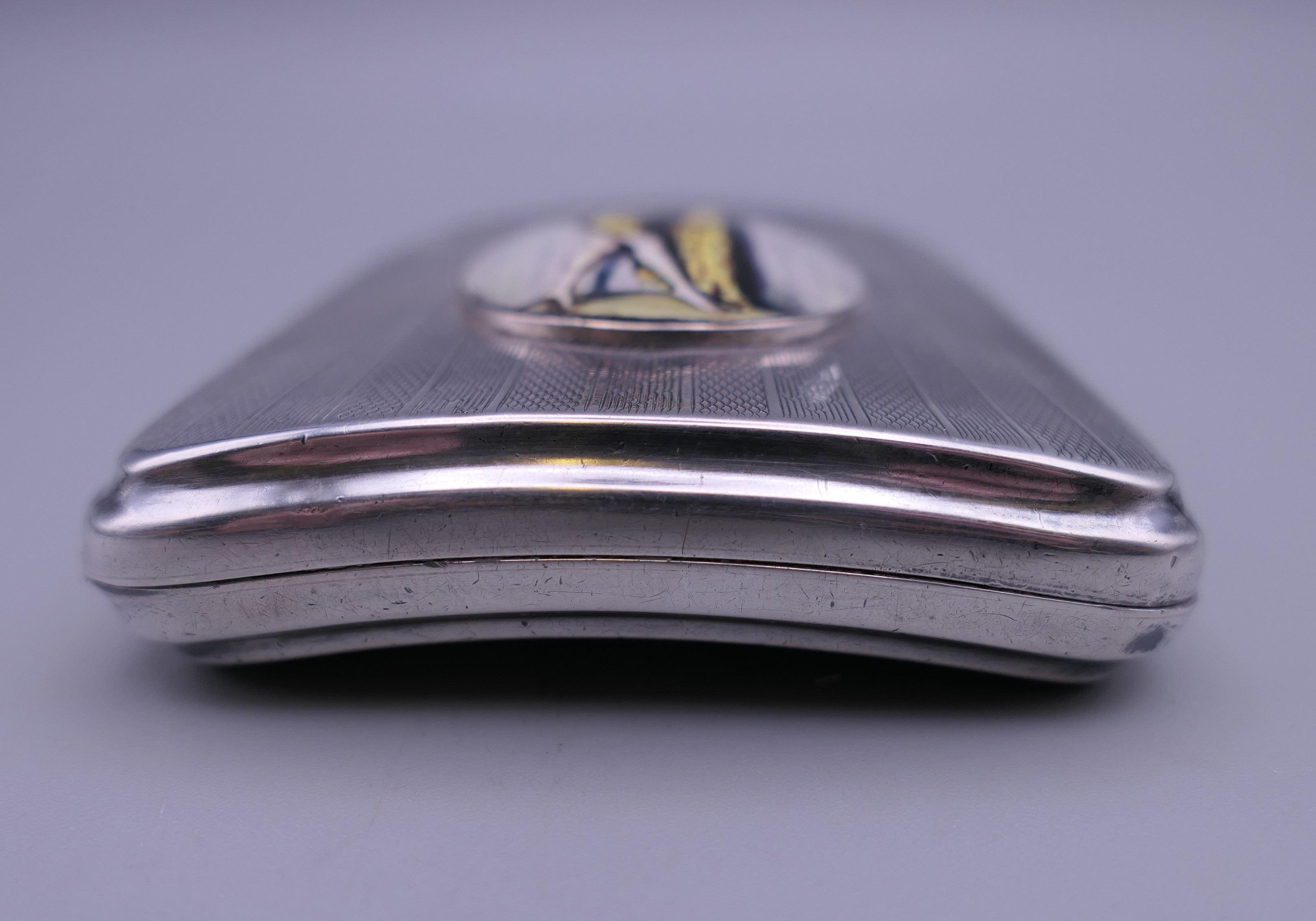 A silver cigarette case decorated with a scantily clad lady. 7 cm wide. - Image 3 of 9