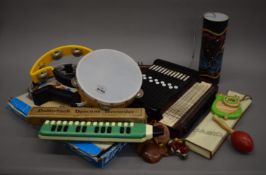 A box of various musical instruments.