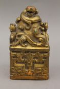 A large Chinese gilded bronze square seal with turquoise and red coral stones. 16.5 cm high.