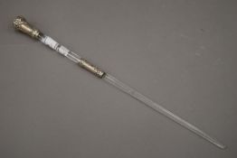 A conductor's baton with silver mounts. 37.5 cm long.