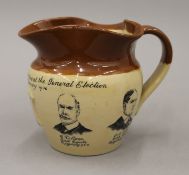 A 1906 General Election Cambridgeshire Commemorative jug. 14 cm high.