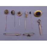 A collection of various gold and other stick pins and brooches. 23.7 grammes total weight.
