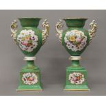 A pair of Paris porcelain green ground vases. 38.5 cm high.