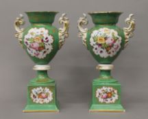 A pair of Paris porcelain green ground vases. 38.5 cm high.