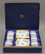 A boxed Coalport coffee set.