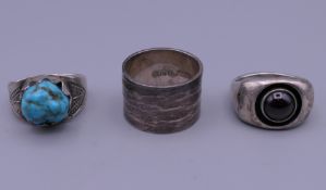 Three silver rings.