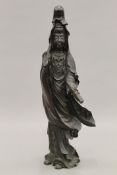 A fine 19th century Japanese bronze depicting Guanyin holding a scroll. 48 cm high.