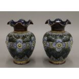 A pair of late 19th century Doulton Lambeth stoneware vases, incised L.W initials to base.