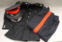 A Royal Artillery uniform and a RAF uniform, together with two others.