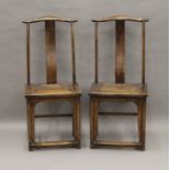 A pair of Chinese chairs.