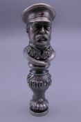 A figural desk seal bearing Russian marks. 7.5 cm high.